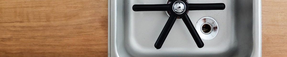 Counter sunk pitcher rinser in wooden worktop